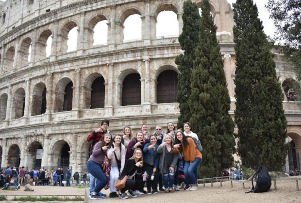 students in front of the Colosseum